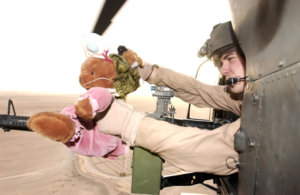 Army Spc. Prepares 'Teddy Trooper' for Descent