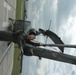 U.S. Air Force Pilot Inspects German Helicopter in Kosovo
