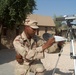 Soldier Monitors Heat Conditions in Baghdad