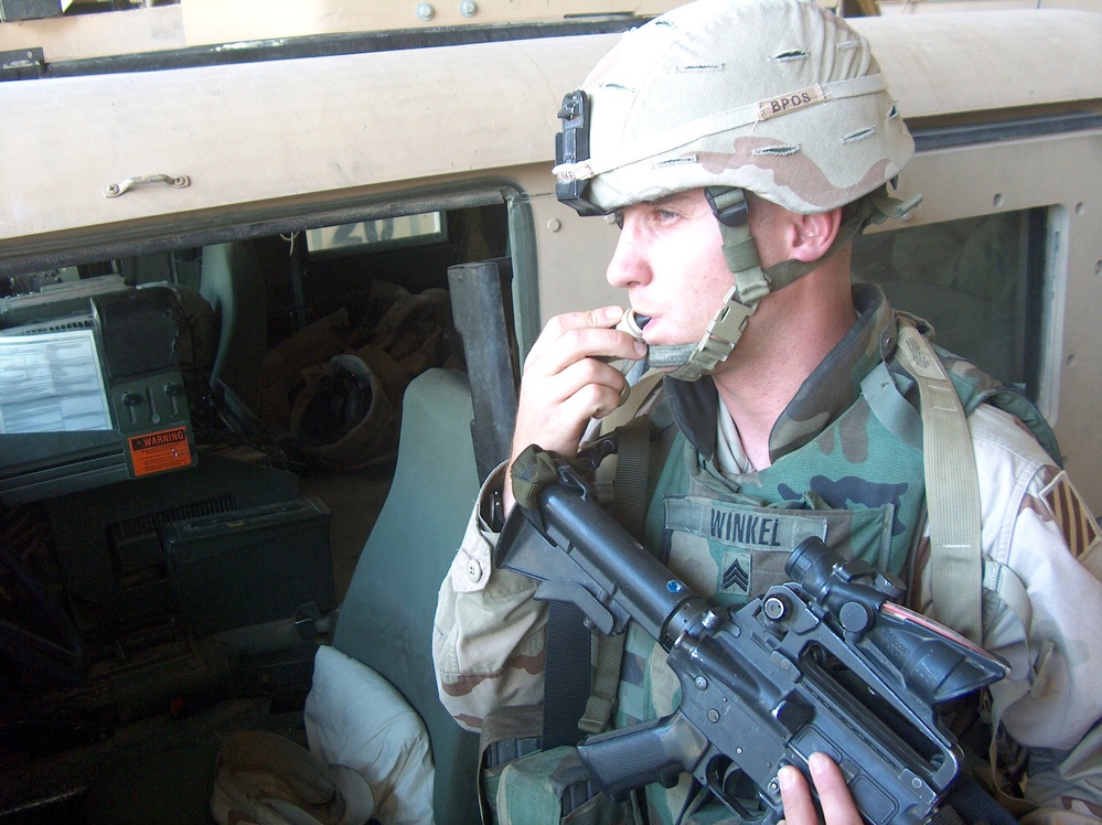Army Sgt. Quenches Thirst in Baghdad