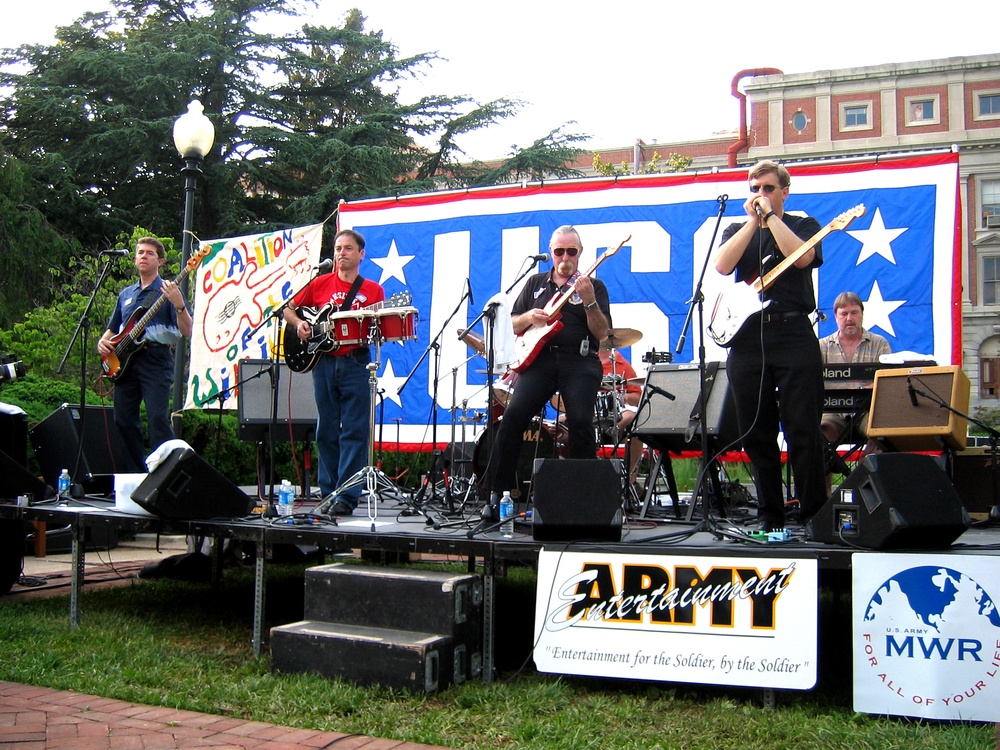 Wounded Servicemembers Entertained by Coalition of the Willing Band at Walter Reed