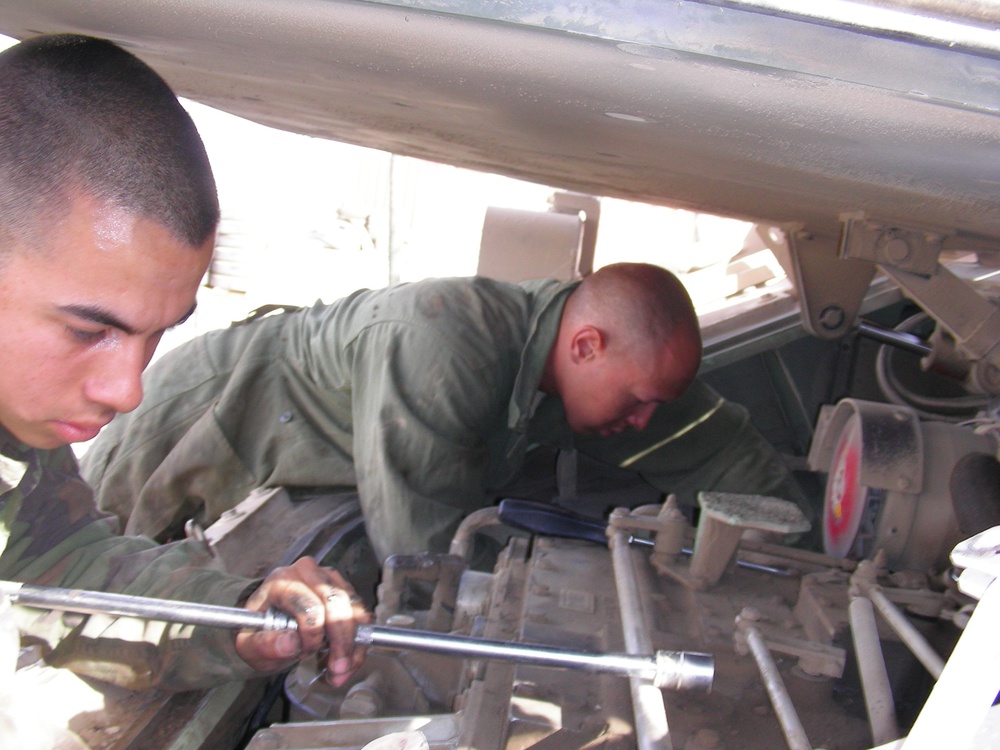 Army Mechanics Repair Bradley Fighting Vehicle in Iraq