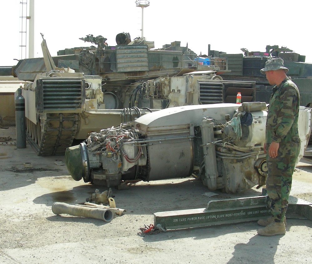 Army Sergeant Prepares Abrams Tank for Deployment in Iraq