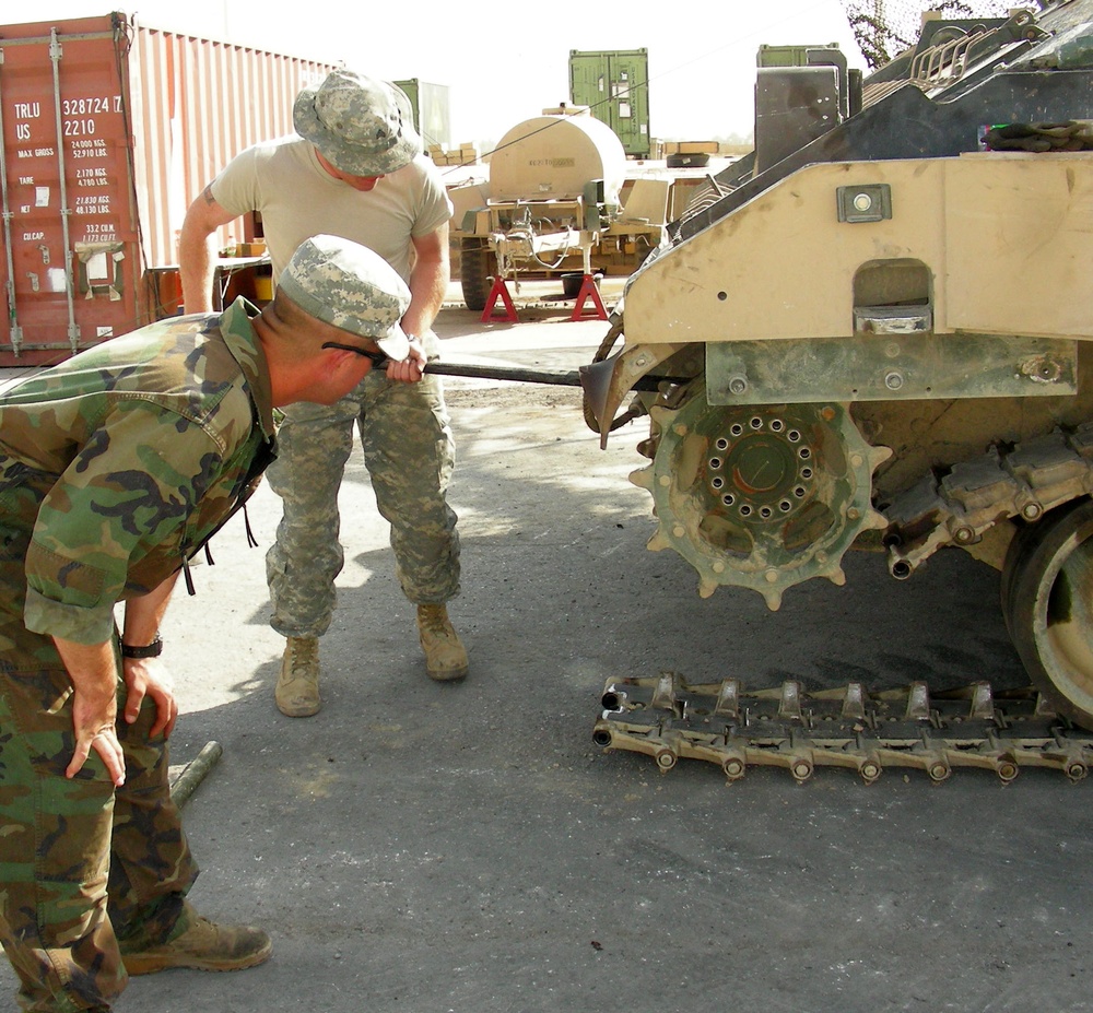 Army Mechanics Repair Bradley Fighting Vehicle in Iraq