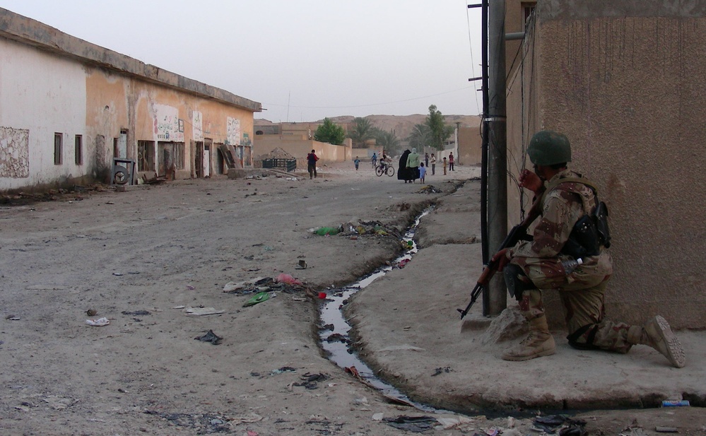 Iraqi Soldier Patrols Captured Sniper Nest in Hit