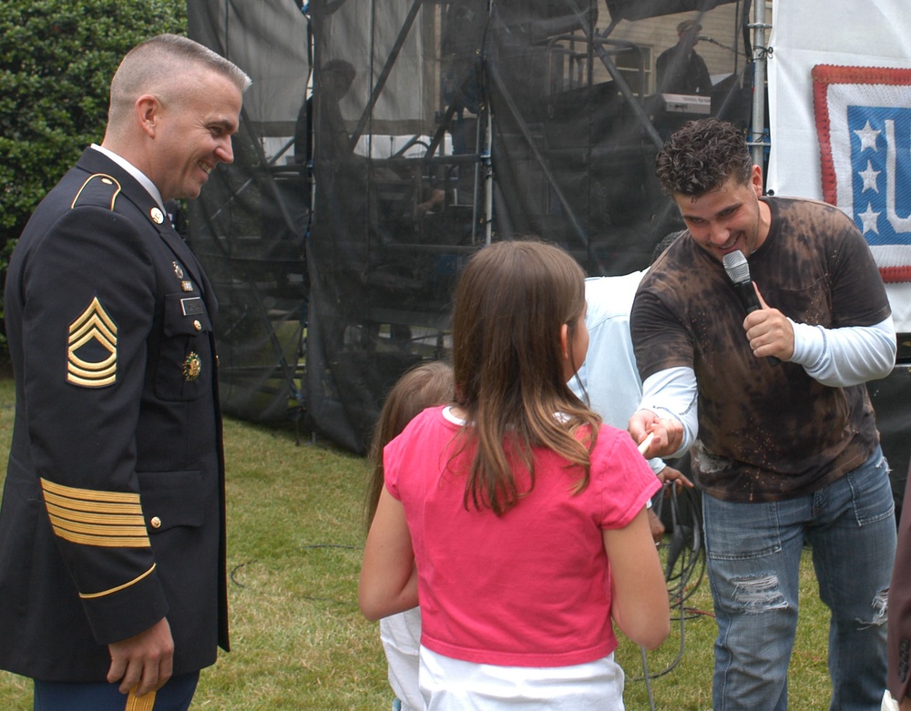 Country Star Josh Gracin Gifts Drumstick to Young Fan at Army Birthday Celebration