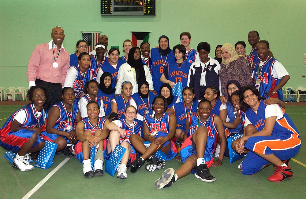 U.S. and Kuwaiti Basketball Teams Pose for Photo After Exhibition Match