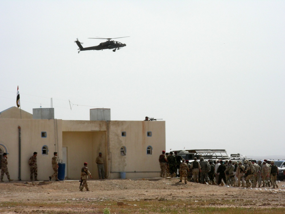 Apache Helicopter Hovers Over Iraq Border Post During Chiarelli Visit