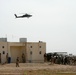 Apache Helicopter Hovers Over Iraq Border Post During Chiarelli Visit