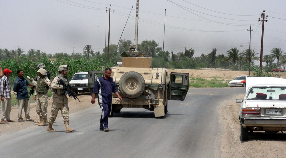 Cavalry Scout Assists Stranded Iraqi Driver Near Taji