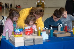 Families Enjoy Sand Art at Joint Service Open House