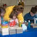 Families Enjoy Sand Art at Joint Service Open House
