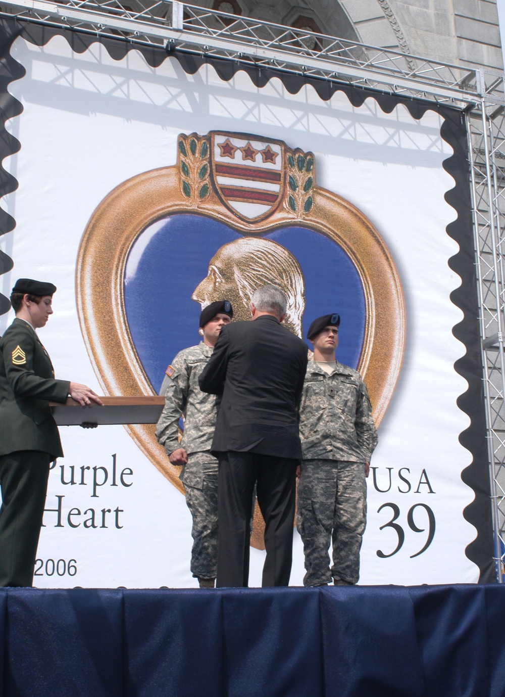 Veterans Affairs Secretary Presents Purple Heart to Army Soldiers at Arlington National Cemetery