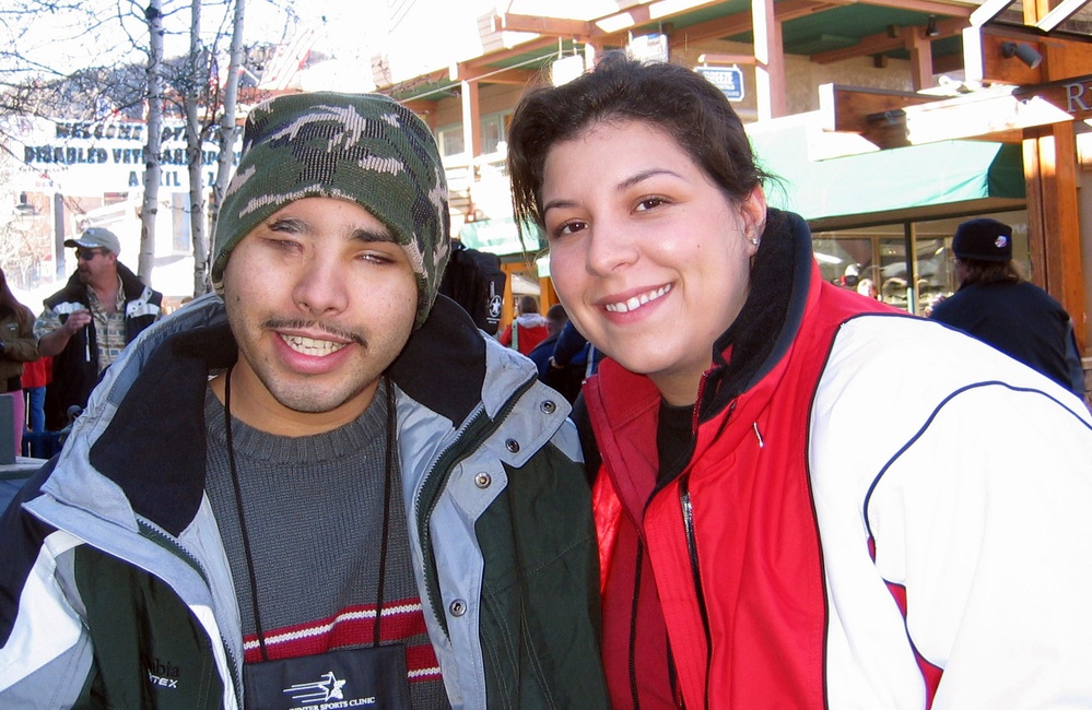Disabled Veteran Couple Enjoys Winter Sports Clinic