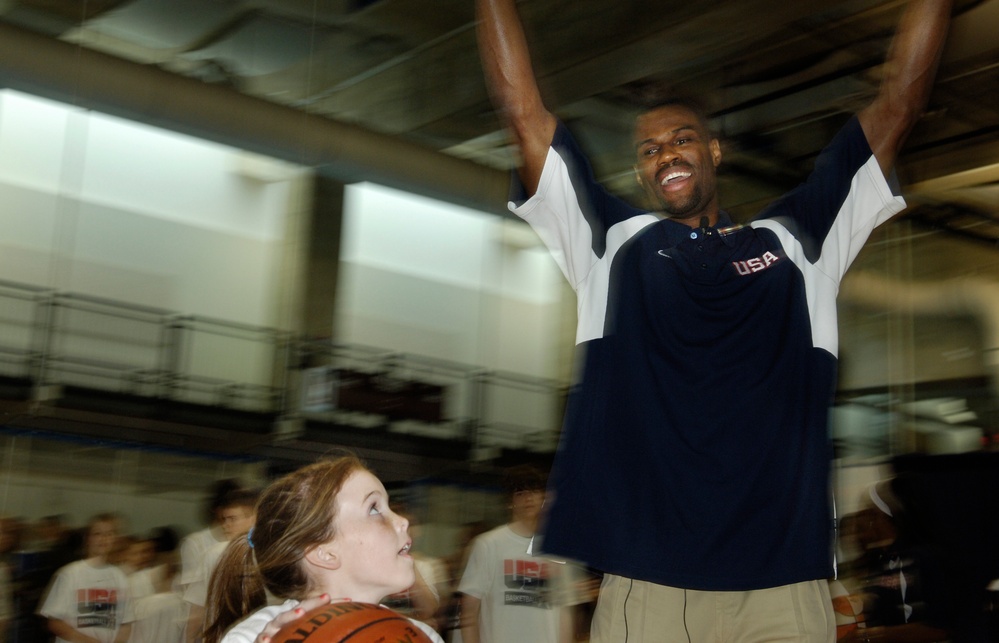 Olympian David Robinson Defends Layup by 11-Year-Old Taylor Livick at 'Hoops For Troops' Event