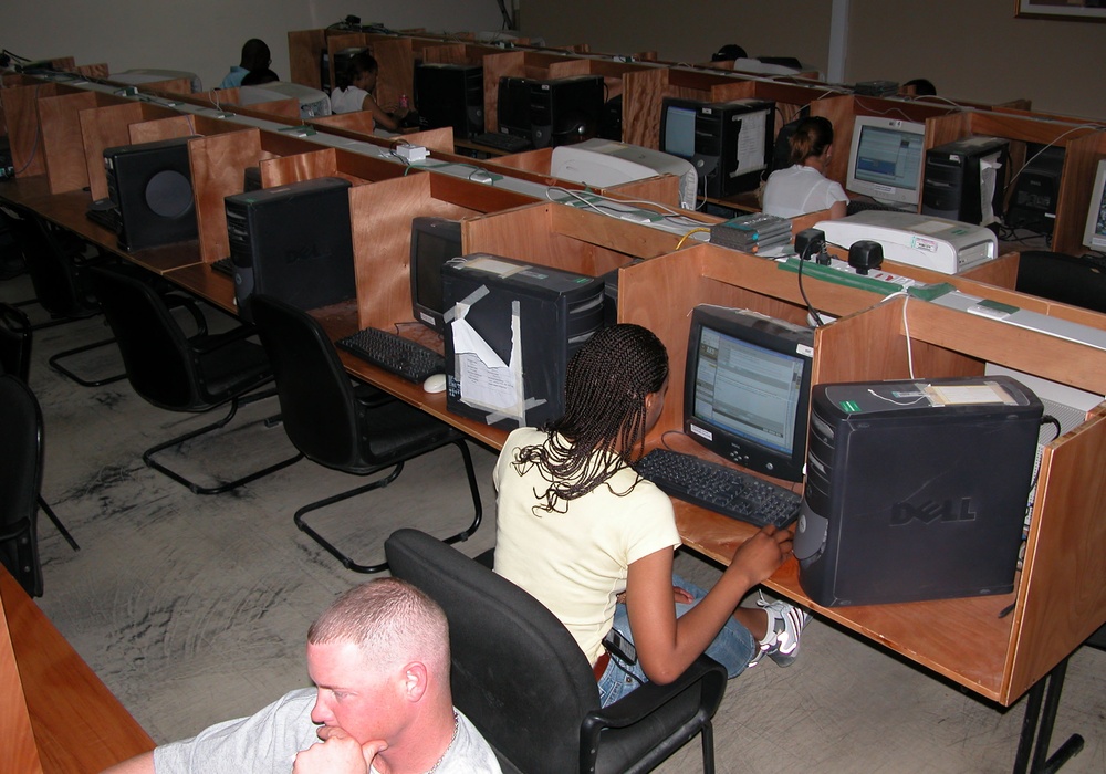 Servicemembers Check Email at Qatar Rest and Recuperation Center