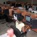 Servicemembers Check Email at Qatar Rest and Recuperation Center