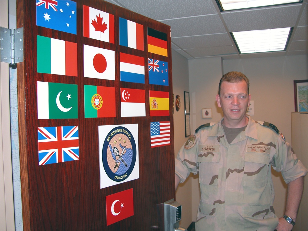 Dutch Navy Officer Stands at Coalition Intelligence Fusion Cell in Bahrain