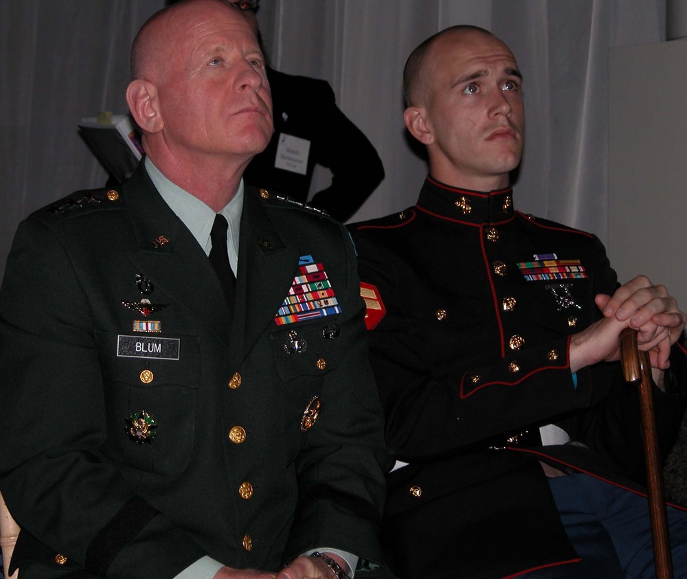 National Guard Leader Honors Wounded Marine Veteran
