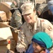 Army Chaplain Helps Afghan Girl Receive Humanitarian Aid at Bagram Air Base