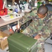 Soldier Cleans Wounded Comrade's Footlocker at Joint Personal Effects Depot
