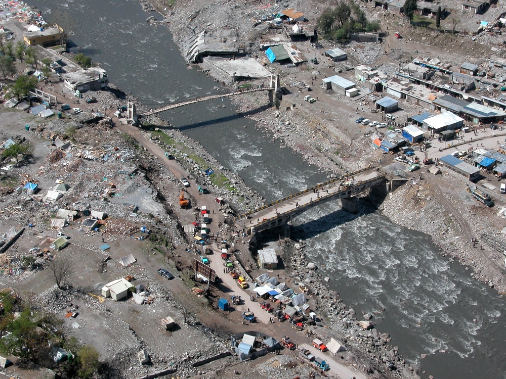 Displaced Pakistanis Seek Shelter Along River Banks Near Muzaffarabad
