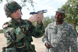 Army Colonel Prepares for Marksmanship Test with Guidance from Retired Sergeant