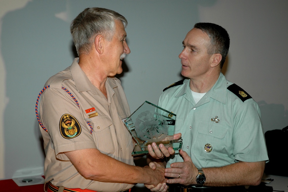 U.S. Senior Enlisted Advisor Presents Gift to South African Warrant Officer at International Conference