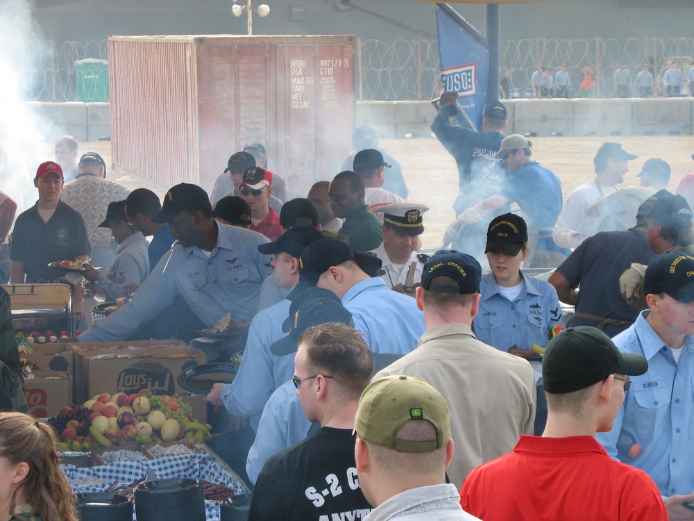 Volunteers Grill Steaks for Deployed Troops
