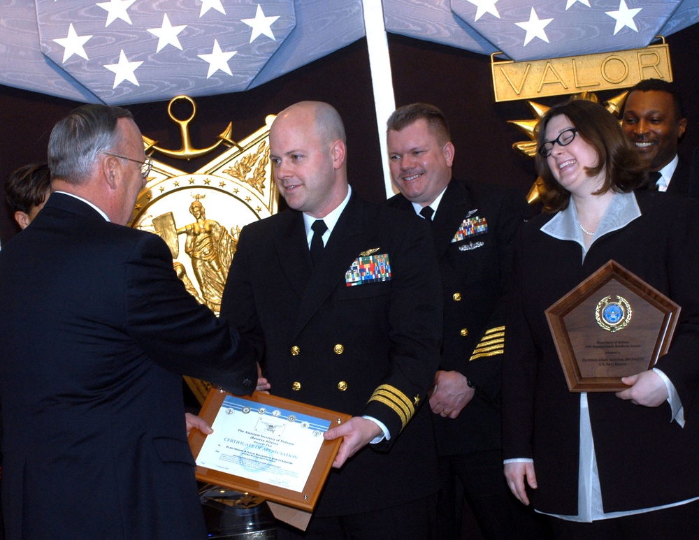 Defense Official Honors Naval Reserve Unit for Family Support Award
