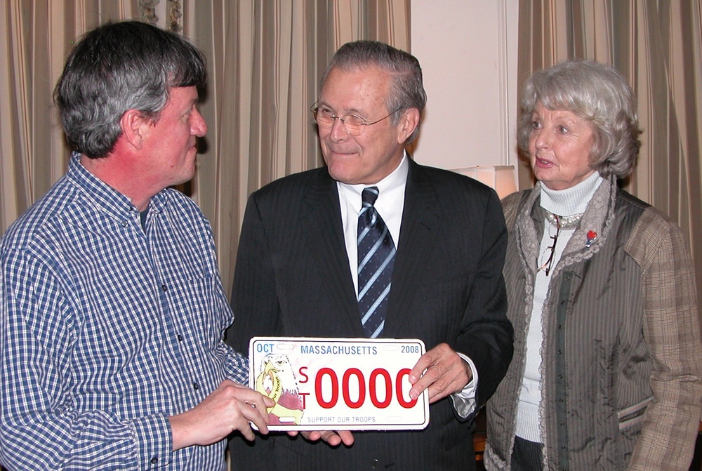 Rumsfeld Receives Auto License Plate from Military Support Group