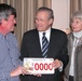 Rumsfeld Receives Auto License Plate from Military Support Group