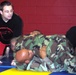 Civilian Instructor Guides Wounded Warrior Through Combatives Training