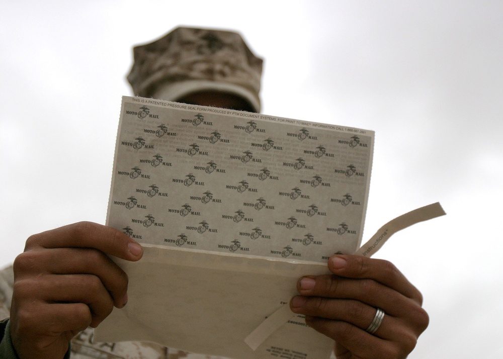 Marine Reads MotoMail on Christmas at Forward Operating Base in Iraq