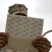 Marine Reads MotoMail on Christmas at Forward Operating Base in Iraq