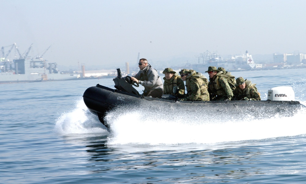 U.S. Marine Instructor Trains Japanese Soldiers in Amphibious Operations