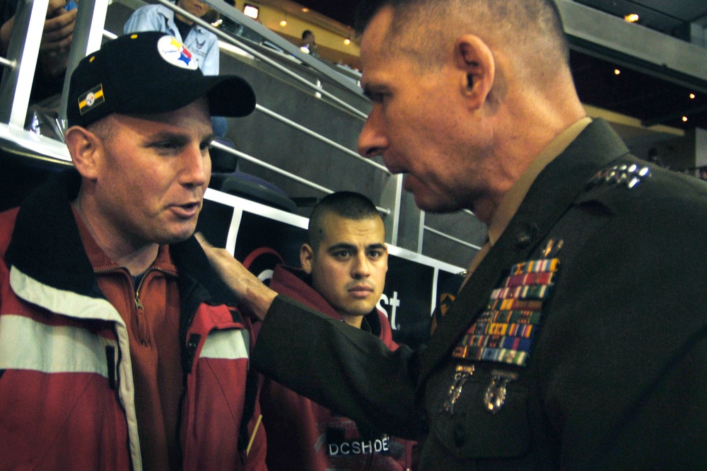 Top Military Leader Visits Wounded Warrior at Hockey Game