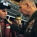 Top Military Leader Visits Wounded Warrior at Hockey Game