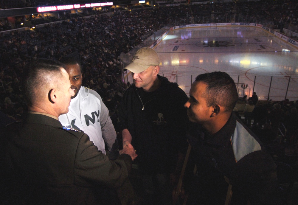 Top Military Leader Attends Hockey Game with Wounded Soldiers