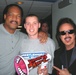 Marine Officer Candidate Poses with WWE Legends at Raw Event