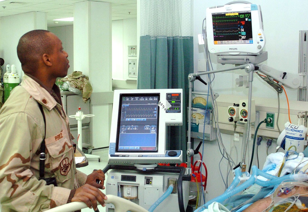 Maj. (Dr.) Clifford Perez Provides Advanced Medical Care to Patient at Craig Joint Theater Hospital in Afghanistan