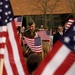 Gen. Pace Visits Elementary School, Greets Students Waving Flags