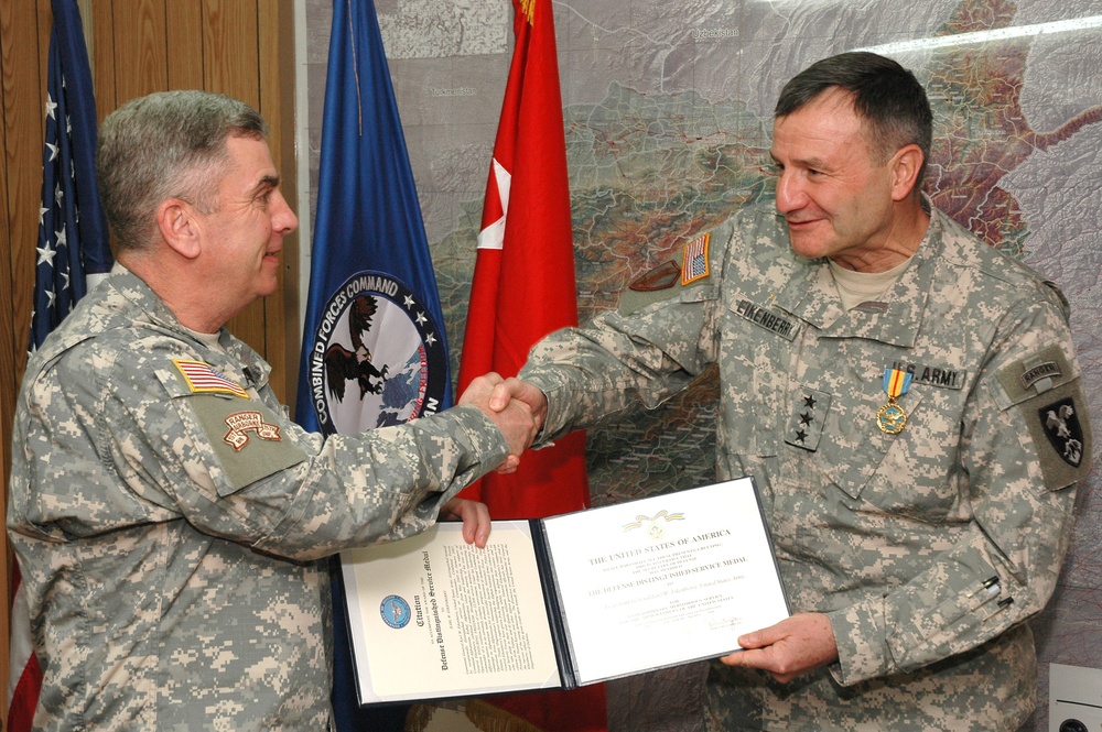 Abizaid Presents Eikenberry with Defense Distinguished Service Medal in Kabul