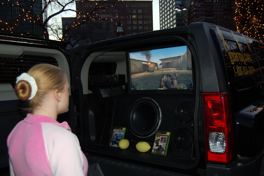 Spectator Tries Out Army's 'America's Army' Video Game at Armed Forces Bowl Pep Rally