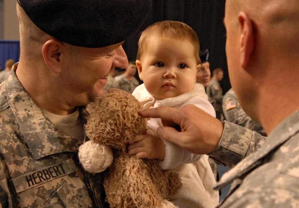 25th Infantry Division Soldier Reunited with Daughter After Unit Redesignation Ceremony