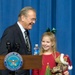 Rumsfeld Shares Smile with Young Troop Supporter at Pentagon Summit
