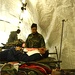 Air Force Chief Master Sgt. Checks on Simulated Burn Patients During Exercise