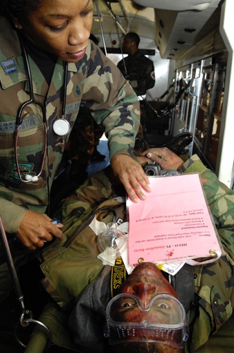Air Force Nurse Treats Simulated Burn Victim During Exercise