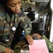 Air Force Nurse Treats Simulated Burn Victim During Exercise