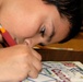 Student Contributes to World's Largest Scrapbook for Military Families